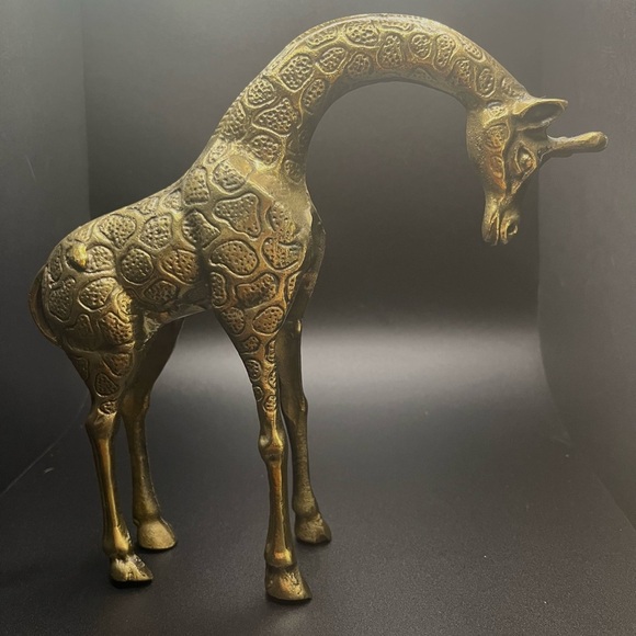 Other - Solid Brass vintage giraffe figurine with a textured hide. 8” tall 8.5” wide